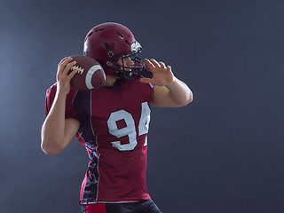 Image showing american football player throwing ball