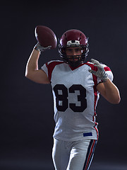 Image showing american football player throwing ball