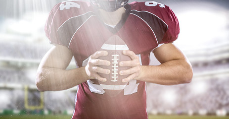 Image showing closeup American Football Player isolated on big modern stadium