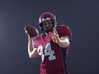 Image showing american football player throwing ball