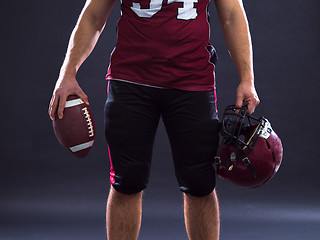 Image showing closeup American Football Player isolated on gray