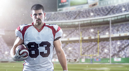 Image showing American Football Player isolated on big modern stadium field