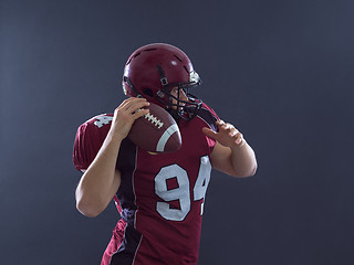 Image showing american football player throwing ball