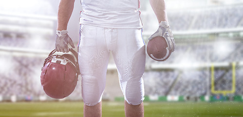 Image showing closeup American Football Player isolated on big modern stadium