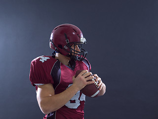 Image showing american football player throwing ball