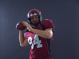 Image showing american football player throwing ball