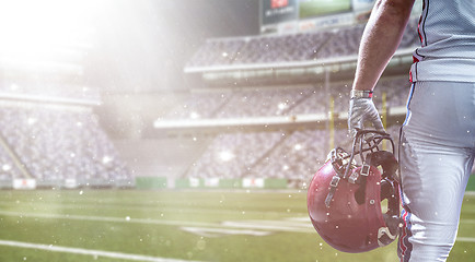 Image showing closeup American Football Player isolated on big modern stadium