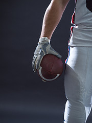 Image showing closeup American Football Player isolated on gray