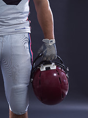 Image showing closeup American Football Player isolated on gray