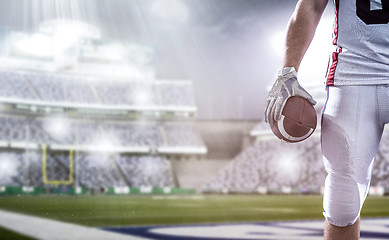 Image showing closeup American Football Player isolated on big modern stadium