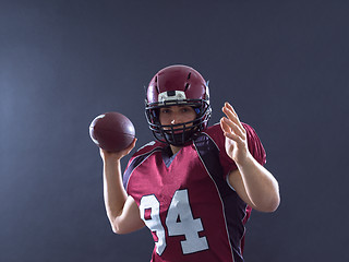 Image showing american football player throwing ball