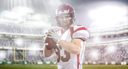 Image showing american football player throwing ball