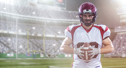 Image showing American Football Player isolated on big modern stadium field