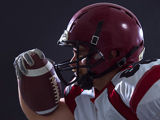 Image showing American football Player running with the ball