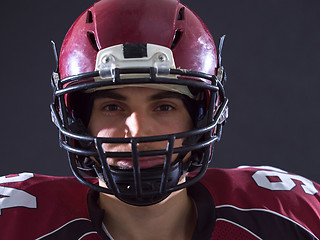 Image showing closeup American Football Player isolated on gray