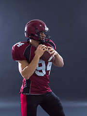 Image showing american football player throwing ball