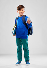 Image showing student boy with smartphone, books and school bag