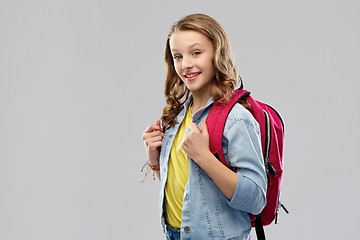 Image showing happy smiling teenage student girl with school bag