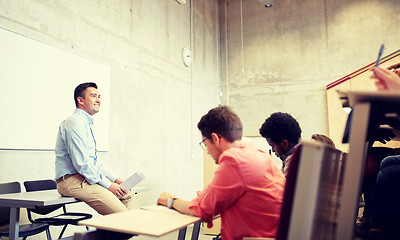 Image showing group of students and teacher at lecture