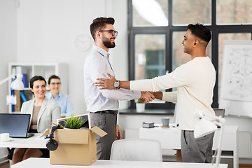 Image showing new male employee meeting colleagues at office