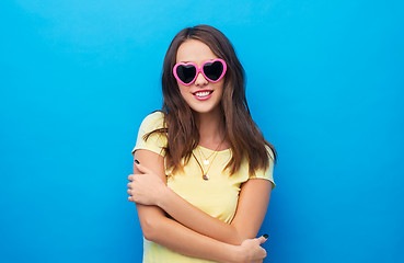 Image showing teenage girl in heart-shaped sunglasses