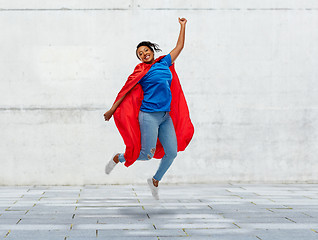 Image showing happy african american woman in superhero red cape