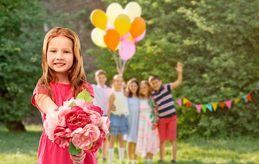 Image showing red haired girl with flowers at birthday party