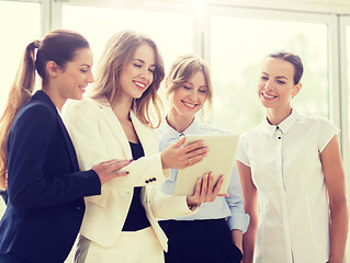 Image showing business people with tablet pc computer at office