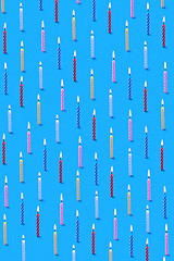 Image showing Vertical background from pattern of burning candles for cake.