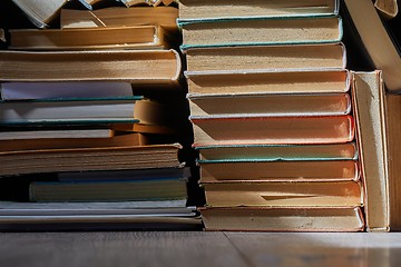 Image showing Wall of books piled up