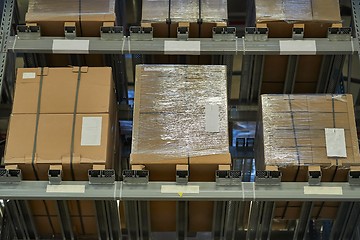 Image showing Warehouse with stocked shelves