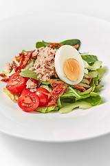 Image showing Close up delicious tuna salad with fresh organic vegetables.