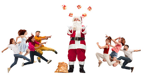 Image showing Happy running Christmas people over white background