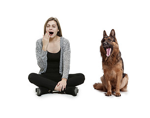 Image showing Woman with her dog over white background