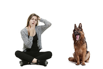 Image showing Woman with her dog over white background