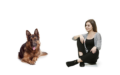 Image showing Woman with her dog over white background