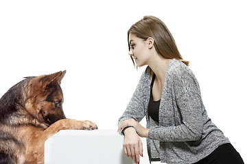 Image showing Woman with her dog over white background