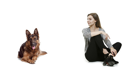 Image showing Woman with her dog over white background