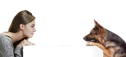 Image showing Woman with her dog over white background