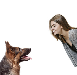 Image showing Woman with her dog over white background