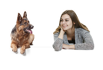 Image showing Woman with her dog over white background