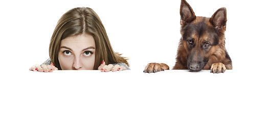 Image showing Woman with her dog over white background