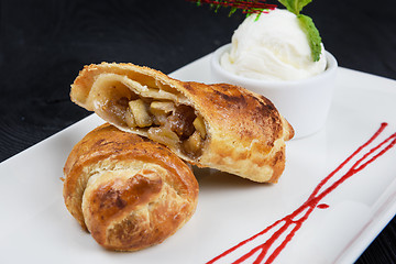 Image showing Apple strudel with vanilla ice cream