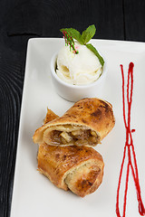 Image showing Apple strudel with vanilla ice cream