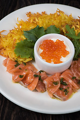 Image showing potato pancakes salmon fish and red caviar