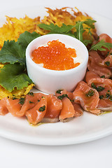 Image showing potato pancakes salmon fish and red caviar