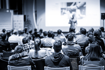 Image showing Male public peaker giving presentation on business conference event.