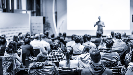 Image showing Male public peaker giving presentation on business conference event.