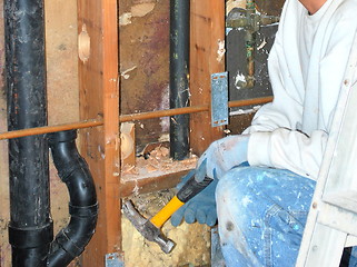 Image showing Water pipe repairman.