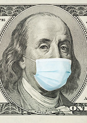 Image showing 100 dollar banknote with medical mask.